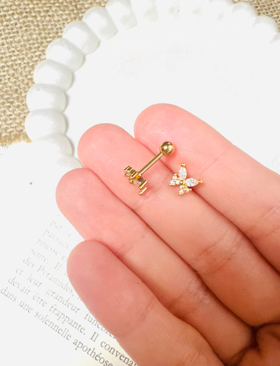 Gold butterfly ball aback earring