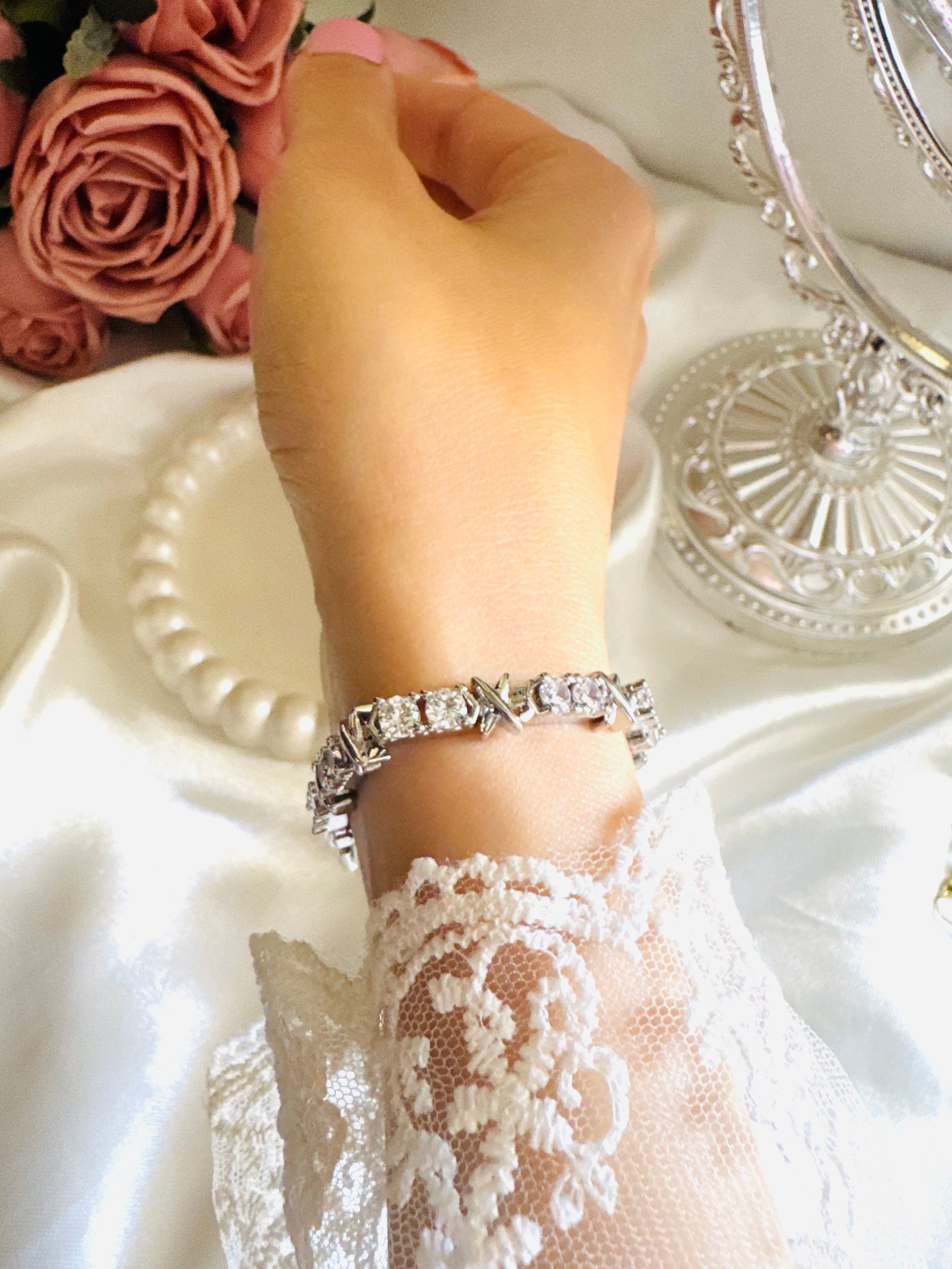 X tennis bracelet