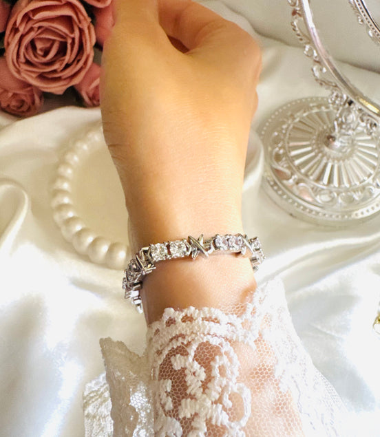 X tennis bracelet