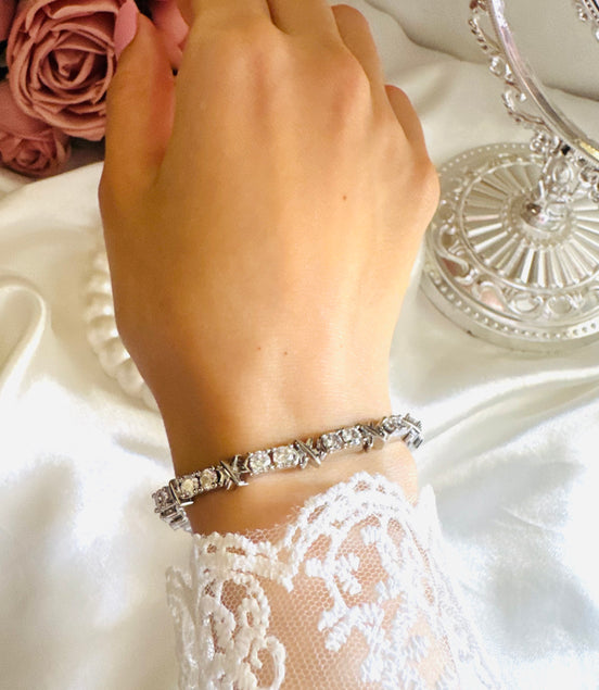 X tennis bracelet